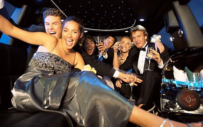 happy young people in a party bus