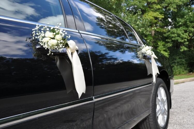 wedding limo door close up with flowers